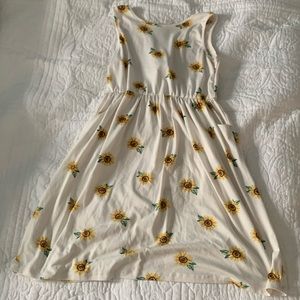 white dress with sunflower design